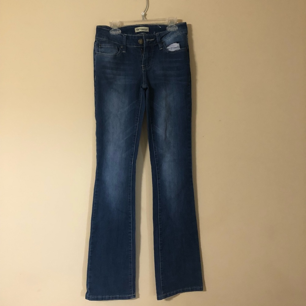 Flair out blue jeans
